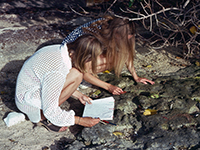 two students collecting data