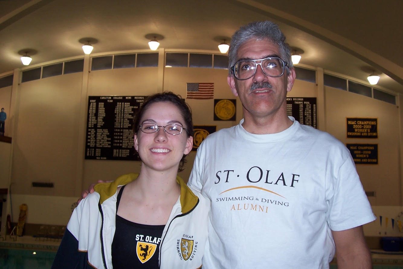 Michelle Cunningham and her father, Paul Howard, at a pool.