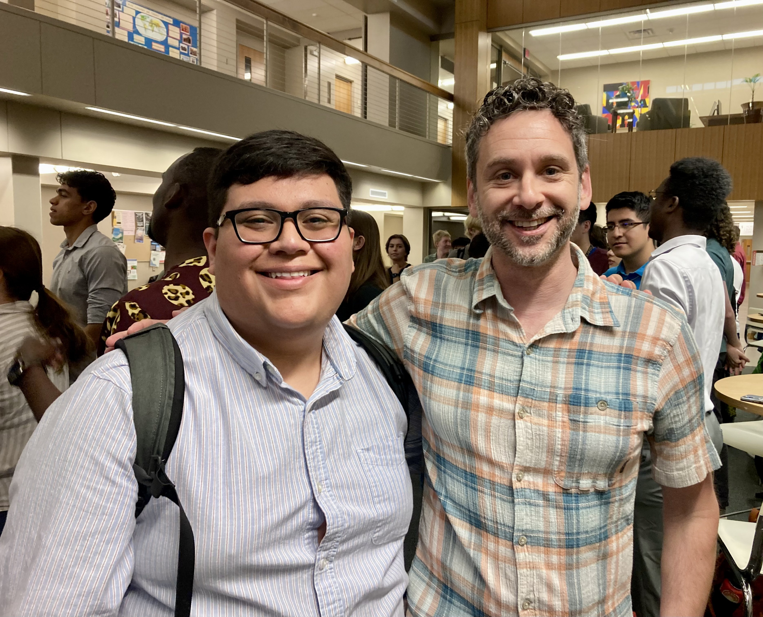 Anthony Calderon Reyes pictured with faculty mentor Seth Binder at the TRIO McNair summer research poster presentation in Tomson Hall Atrium