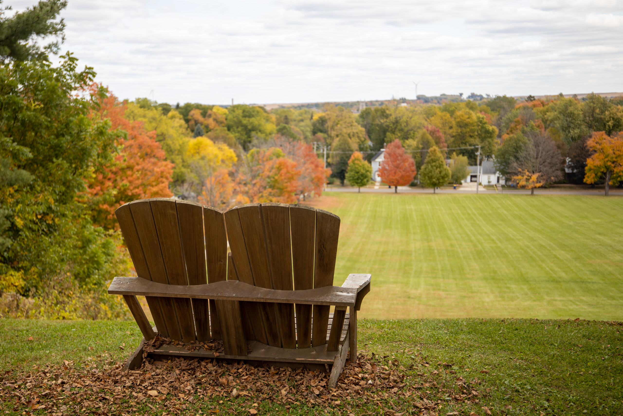 Two chairs overlooking the St. Oaf College lawn