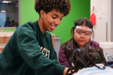 Community-Based Work Study student working with local elementary school students