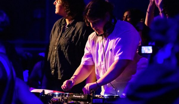 Image of a student disc jockey performing at the Lion's Pause