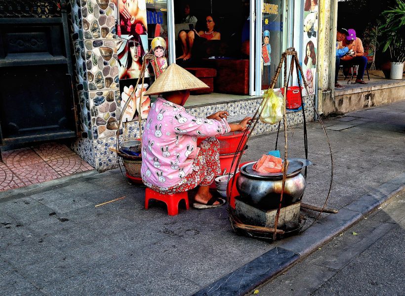 Vietnam woman cooking street.jpg
